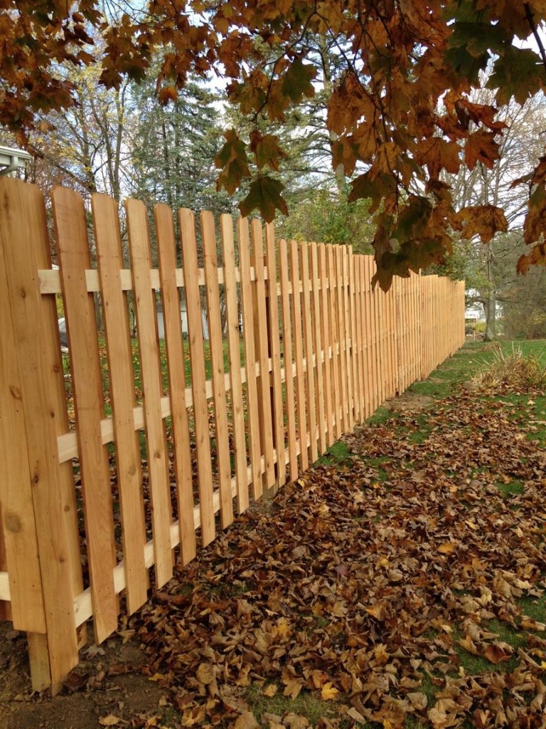 Premade wood fence panels.