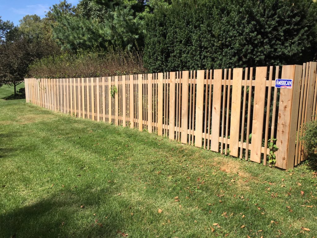 Custom alternating picket fence made of wood
