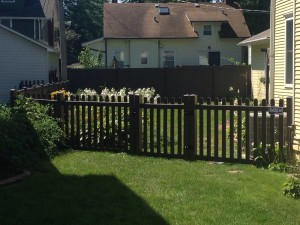 Chestnut brown vinyl picket fence, 4' tall
