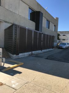 A PalmSHIELD louvered fence installed for the City of Los Angeles's Department of Water and Power for their mechanical equipment systems