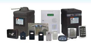 A selection of access control equipment, including operators, transmitters, key pads, photo eyes and other entry control