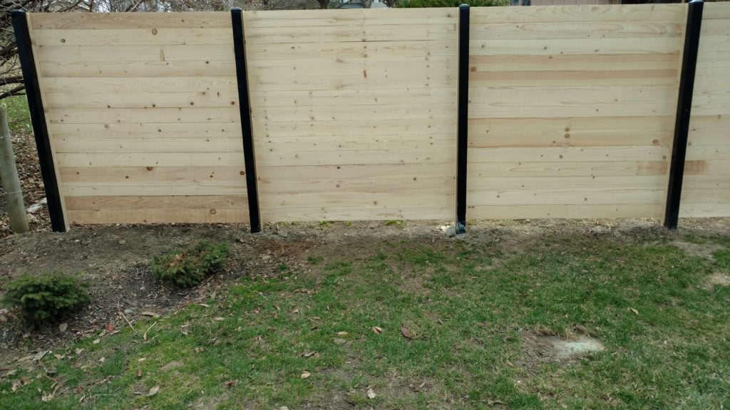 Horizontal wood cedar plank fence