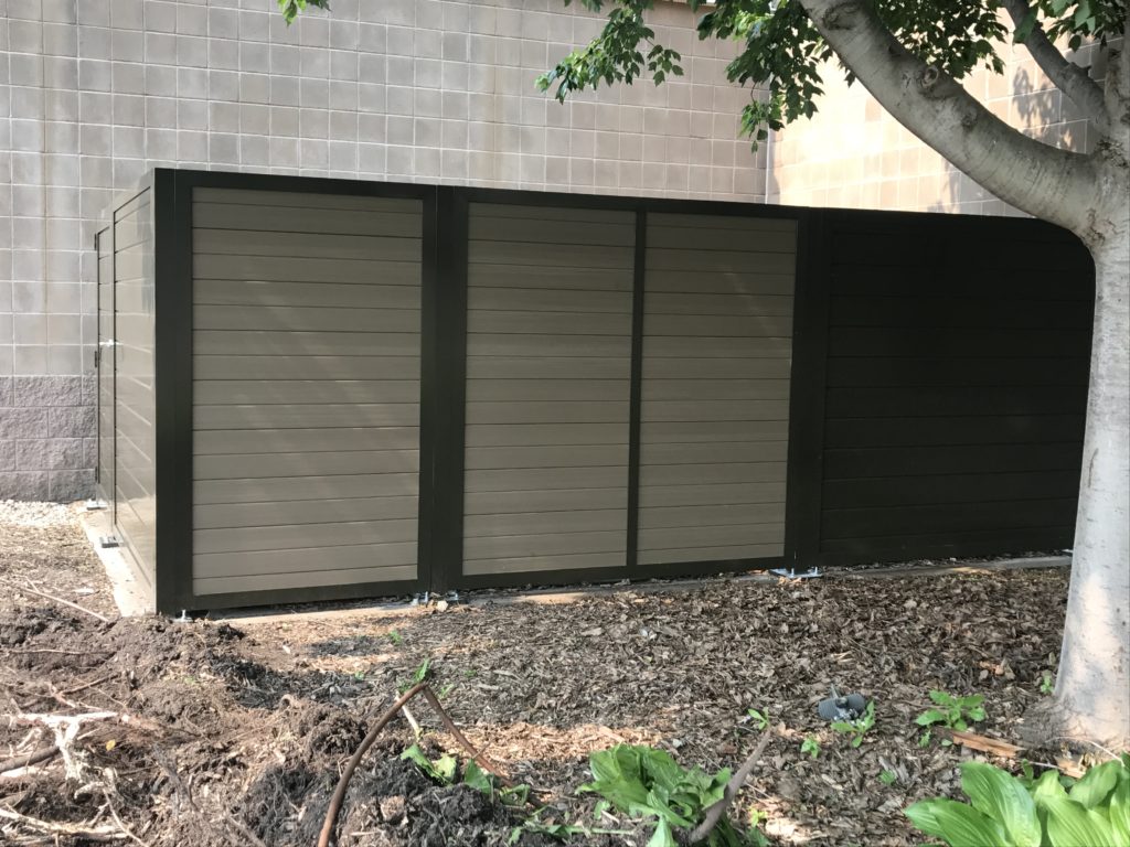 PalmSHIELD vinyl solid architectural screening enclosure with door