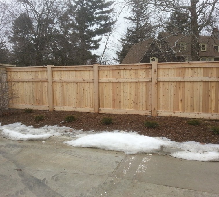 The American Fence Company - Wood Fencing, 6' Custom Wood With Stone Columns - AFC - IA