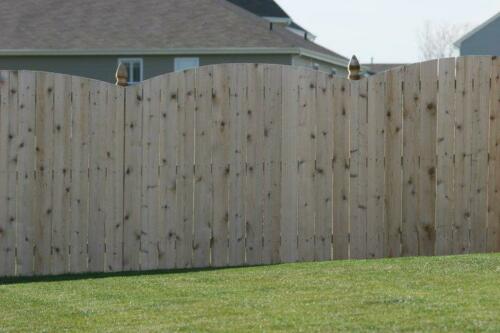 6-8 foot tall overrscalloped pattern privacy wooden fence