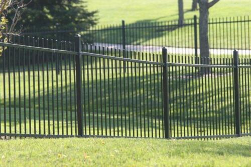 6 -8 foot black ornamental fence surrounding park