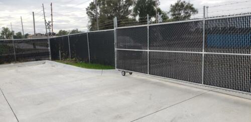 6 -8 foot grey chain link automatic slide gate