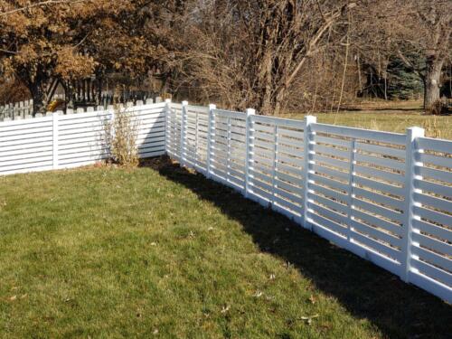 5-8 foot tall white vinyl fence with planks facing horizontally