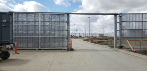 6 - 8 foot automatic grey slide gate