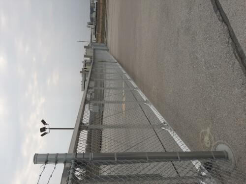 6 - 8 foot automatic grey chain link slide gate