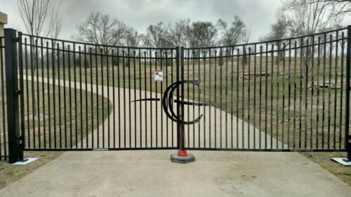 6 - 8 foot tall black custom ornamental dipped arch swing gate