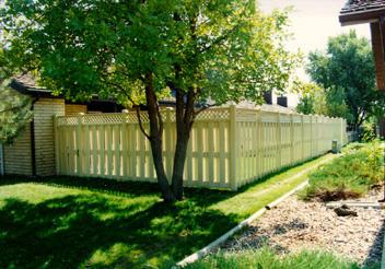 6-8 foot tall shadow-boxed vinyl fencing with a decorative crisscross stitching on the top 3-6 inches of the fence