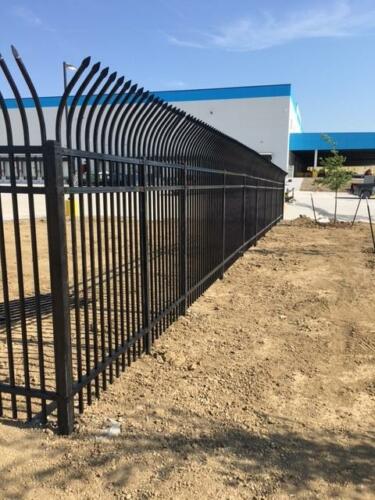 8 foot black fence with curved top rods